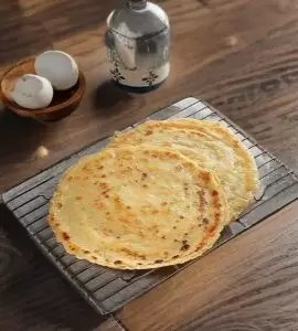 Egg Dry Fruit Bettered Paratha Pancake Style